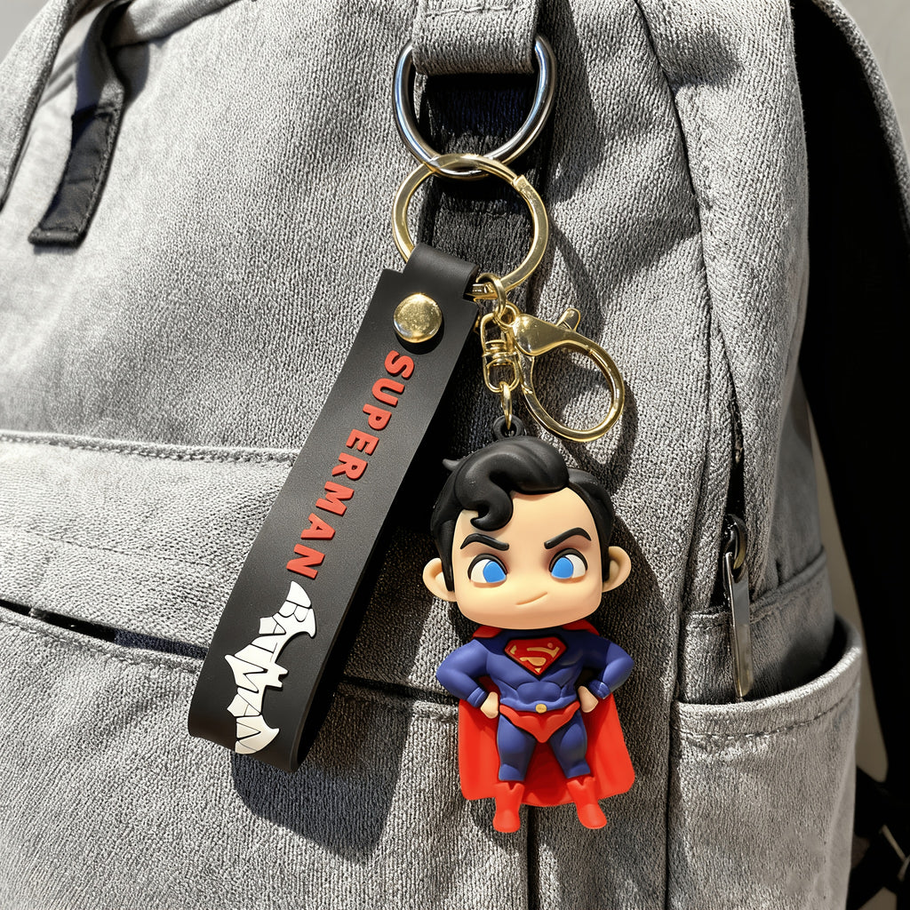 {Officially Licensed} 1 pc Justice League Superman character keychain, exquisite charm with metal clasp, suitable for backpacks, car accessories, and Christmas gifts. Durable metal and PVC material, a travel essential, fun design | Durable keychain
